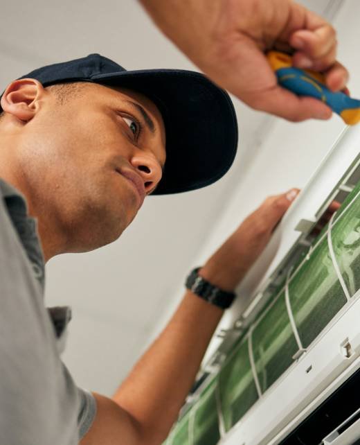 Maintenance, air conditioner and man with screwdriver for problem solving on machine from below. Ai Maintenance, air conditioner and man with screwdriver for problem solving on machine from below. Ai